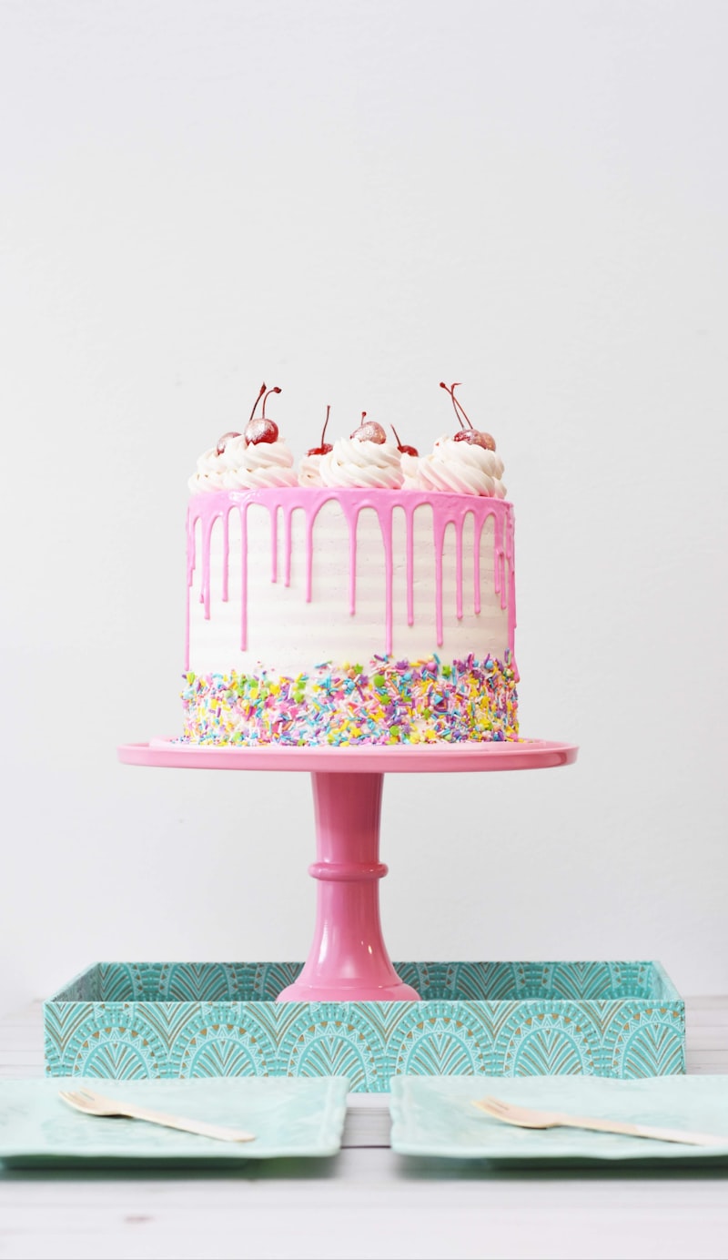 Homemade vanilla celebration cake with floral decoration from SweetCrush Pune